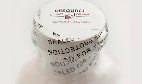 Closeup of a shrink enclosure on a bottle cap