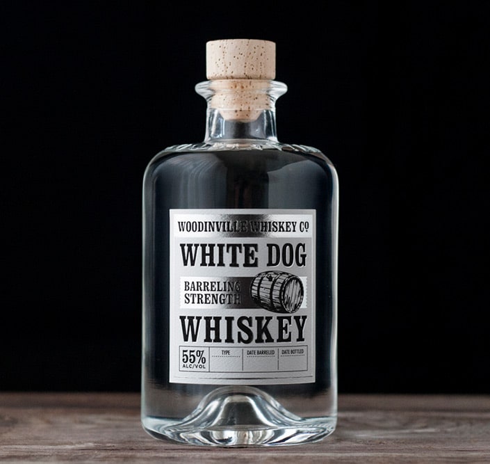 White Dog Whiskey bottle with custom foil stamped label