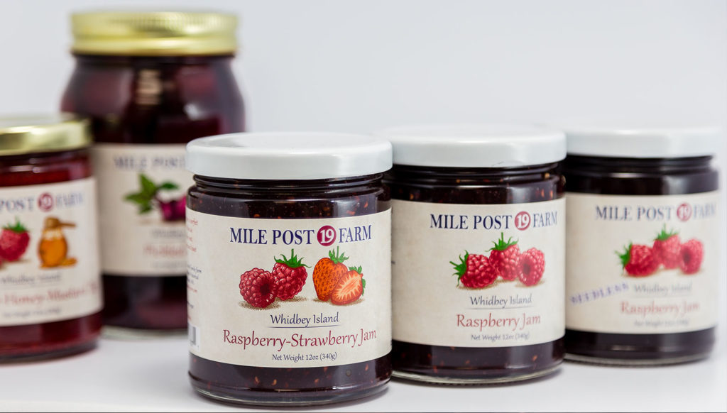 Mile Post 19 Farms jelly jars with custom labels with fruit illustrations