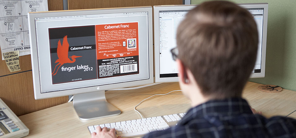 Resource Label Group designer designing a custom label on his computer