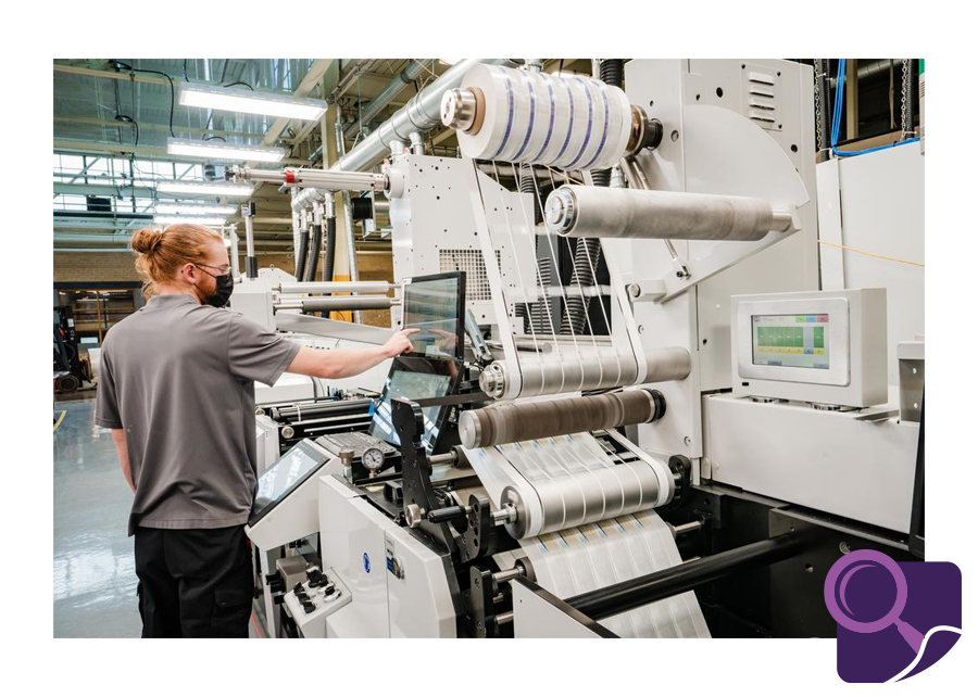 Man working at a printing press