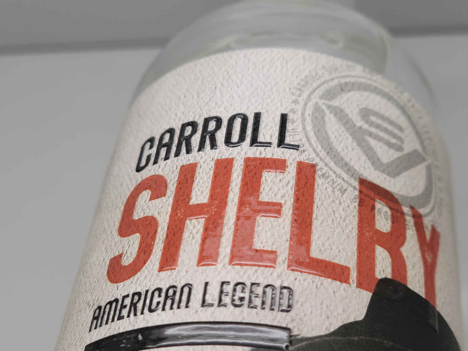Carroll Shelby label featuring tactile screen-printed decoration