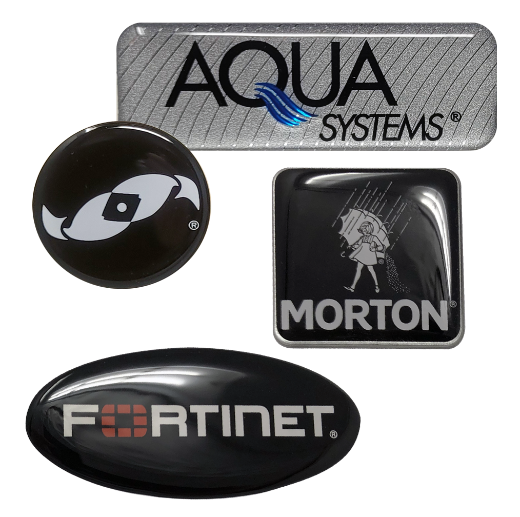 Examples of custom domed labels with raised clear resin coating