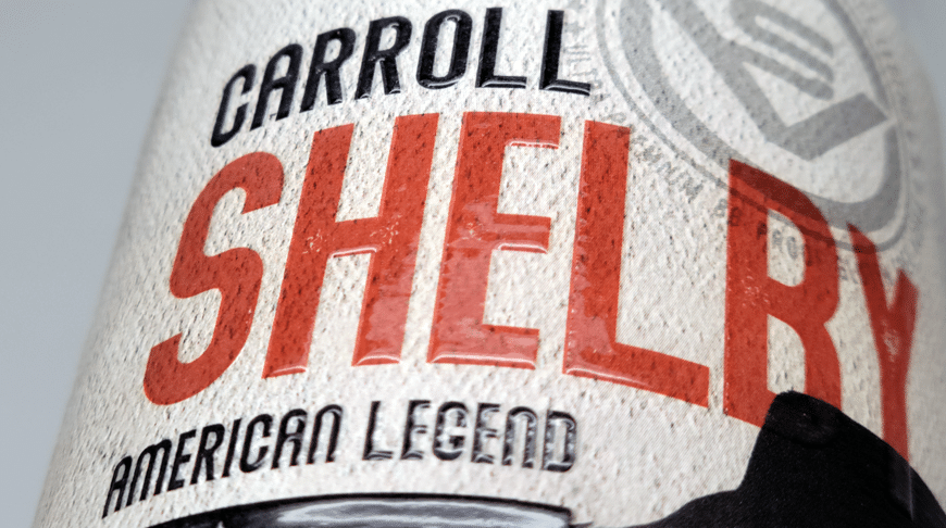 Premium spirits bottle detail showing shelf impact and label interaction