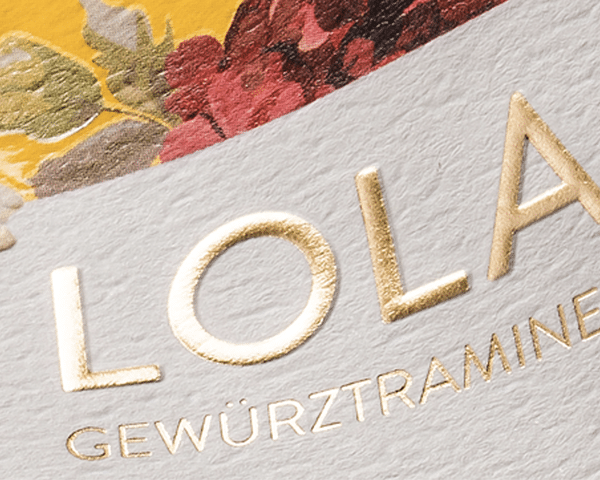Hot foil and emboss detail on a premium label
