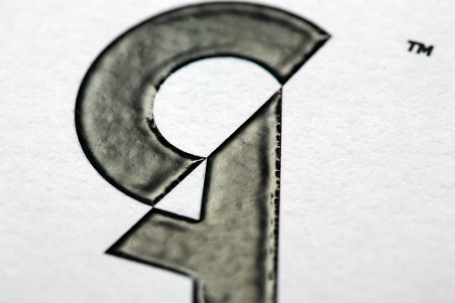 Close-up of high-build tactile varnish on a premium product label